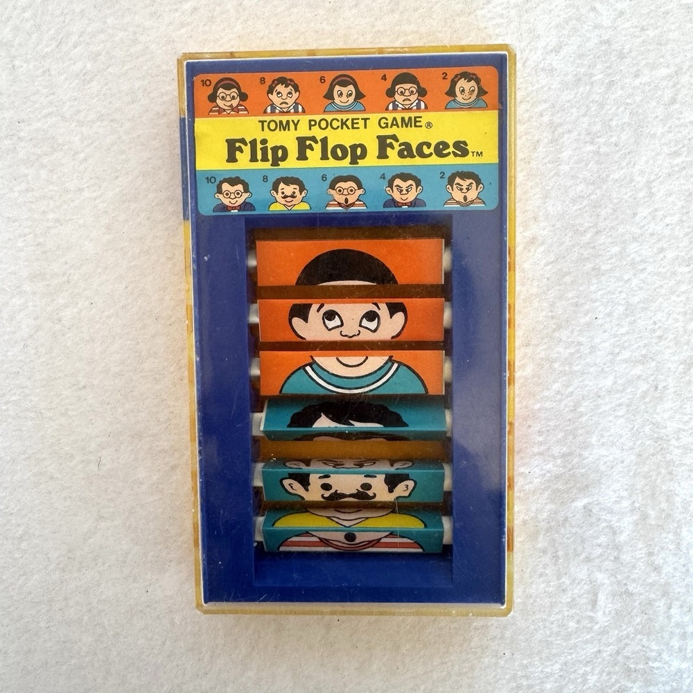 Vintage TOMY Flip Flop Faces Handheld  Plastic Pocket Game Collectible